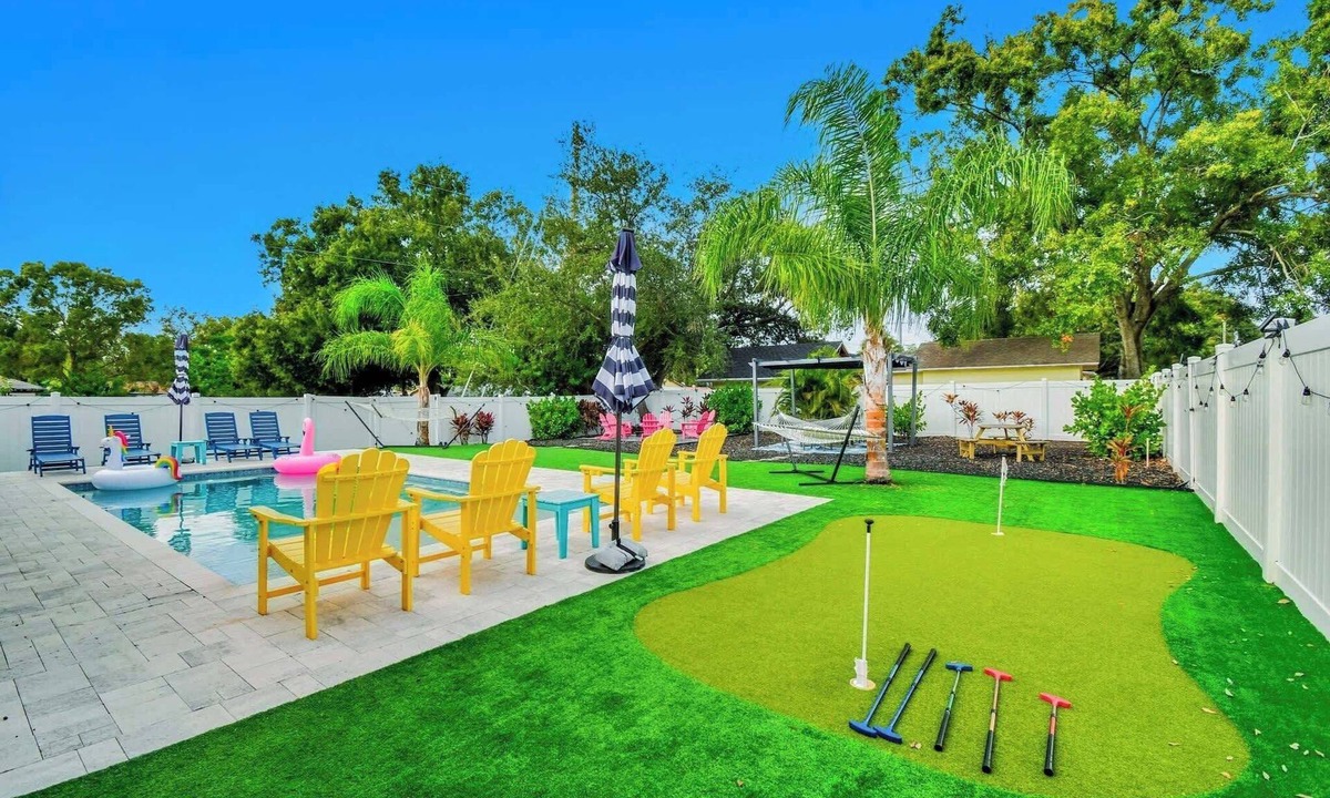 Sun Bay South House | Stylish Backyard PARADISE! Pool, Golf, Fire Pit