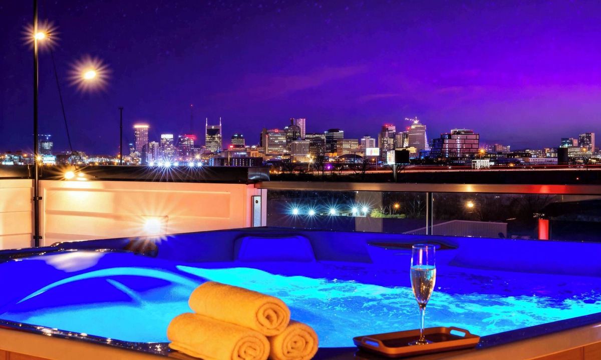 Katie Hill Neighborhood House | Summer rooftop hot tub, game room, skyline views near Broadway