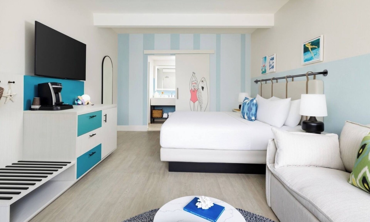 New Town Hotel | Sun, Sip, & Socialize | Island Stay with 2 Pools & Lawn Games