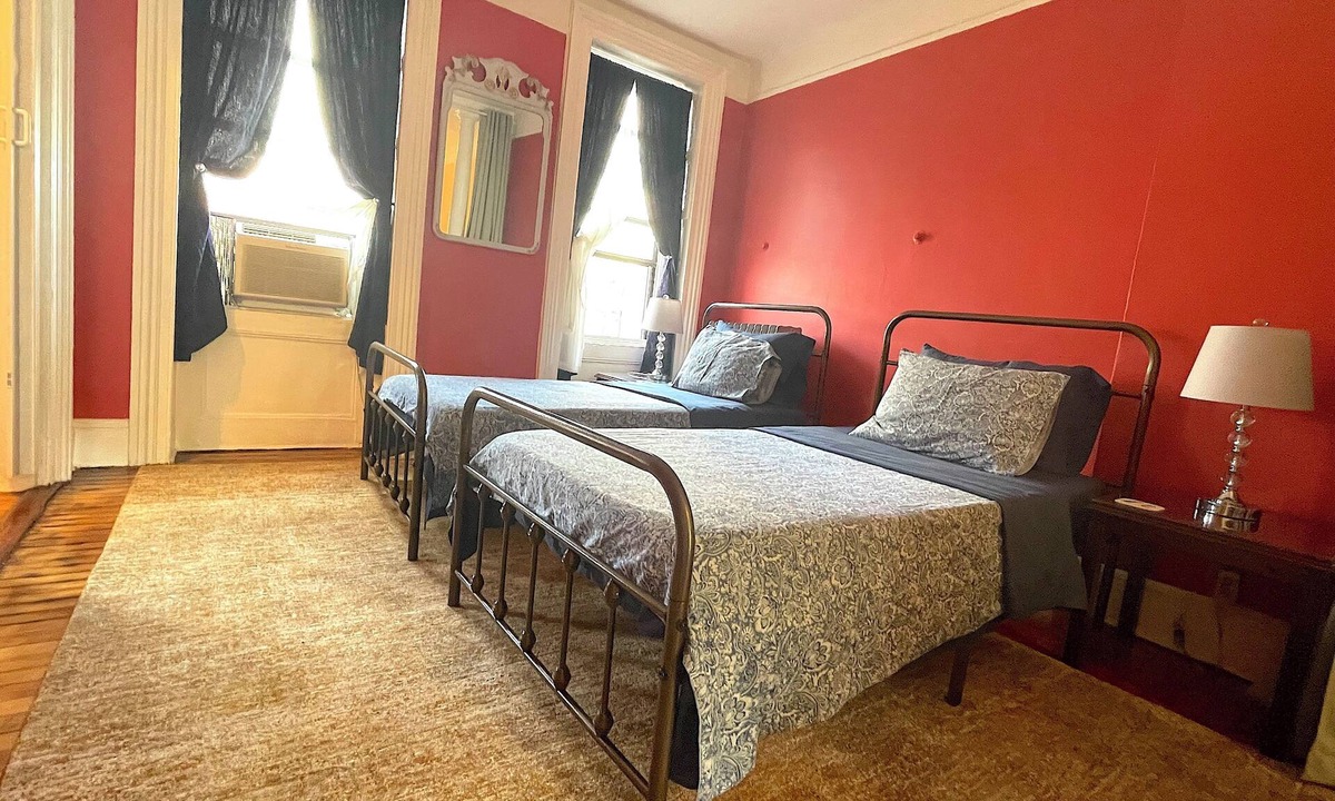 McGinley Square Apartment | Sunlit Brownstone Haven Near NYC