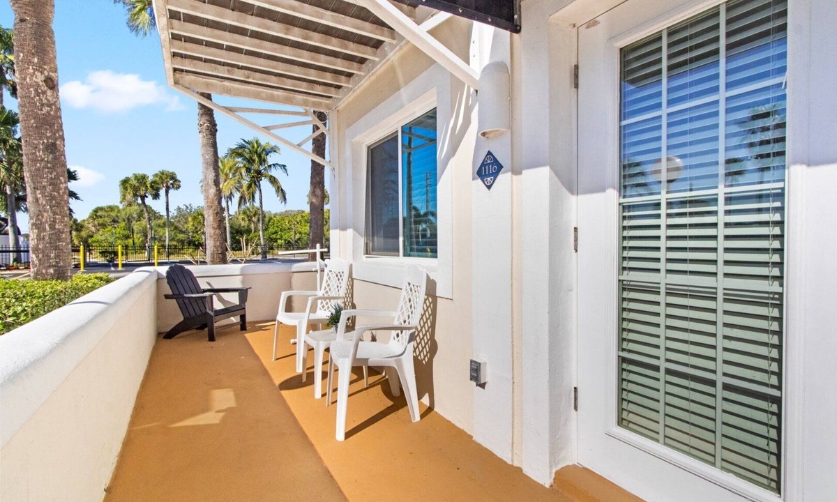 Cape Caneveral Beach Gardens Condo | Sunlit Ground‑Floor Corner Condo ☀️ Private Patio, Steps to Beach & Pool!