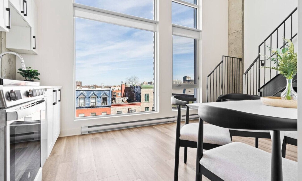 Plateau Mont Royal Apartment | Sunny Duplex Penthouse on St-Laurent Blv.