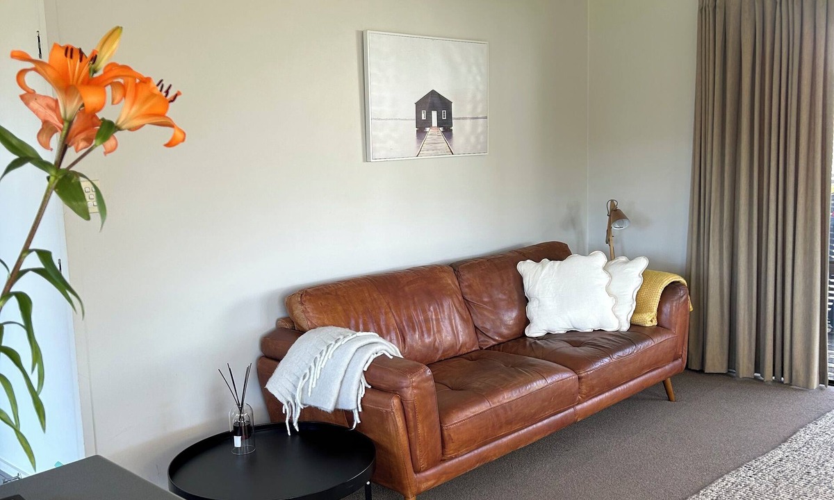 Papamoa Beach House | Sunny Papamoa beach bach- steps to the sand….