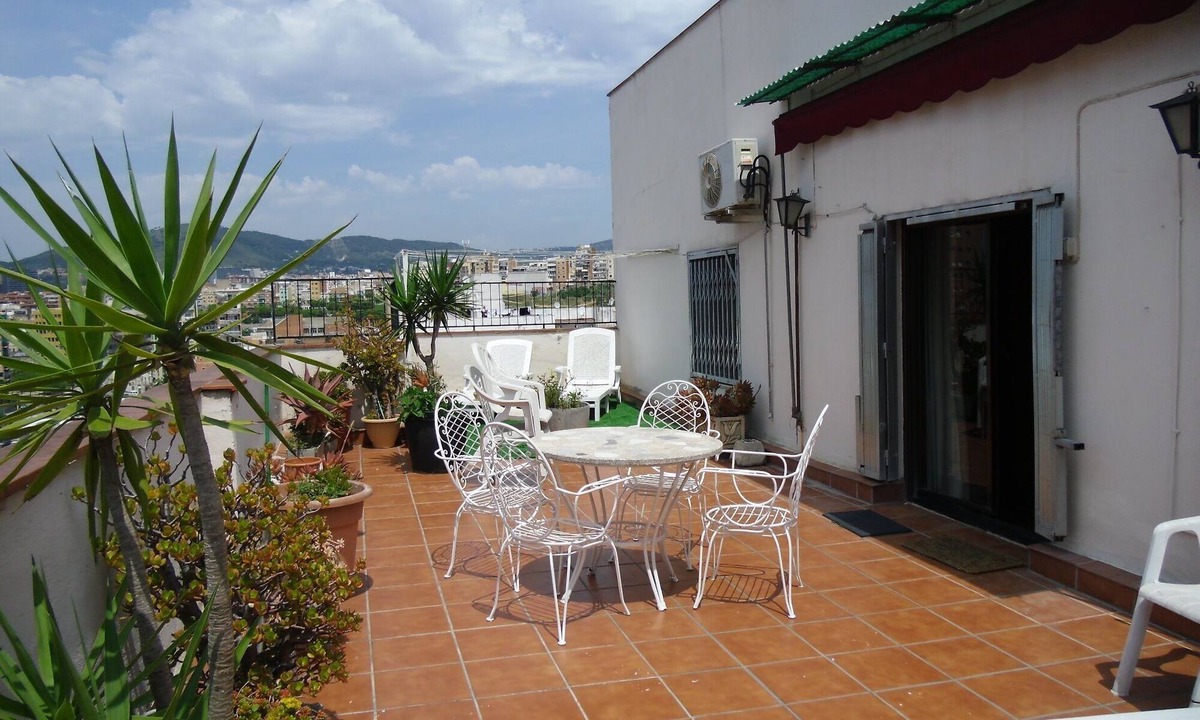 L'Hospitalet de Llobregat Apartment | sunny penthouse overlooking city and mountains