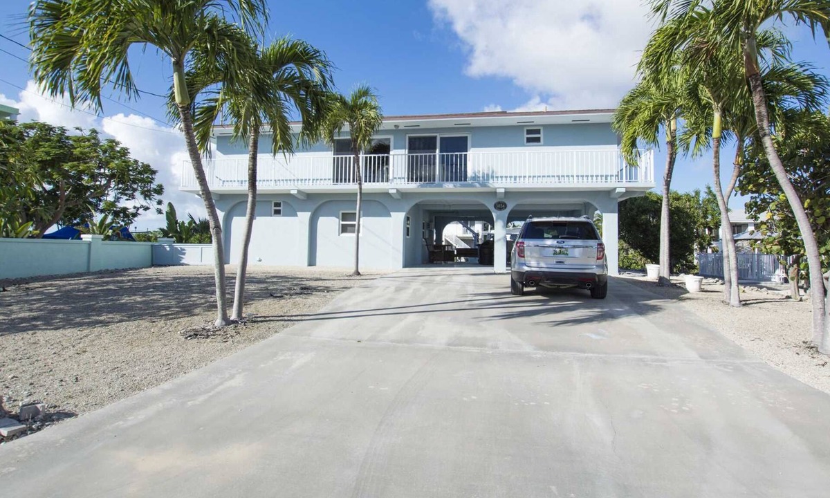 Port Pine Heights House | Sunset Hideaway, Pool home on canal