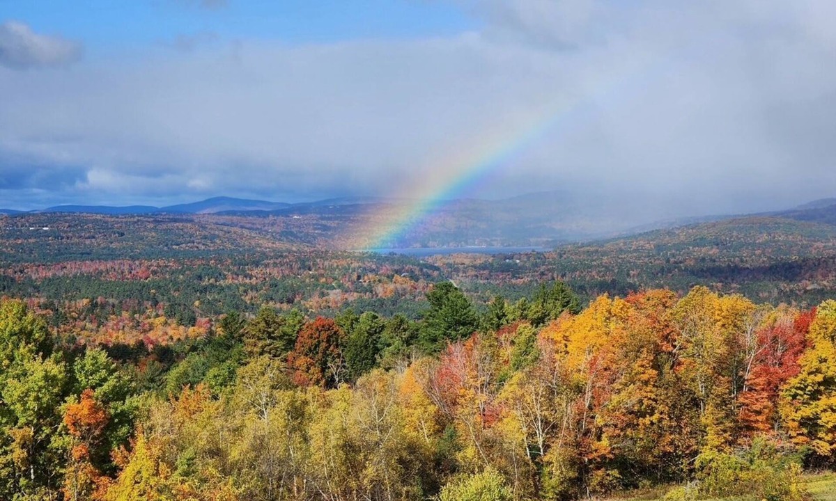 Center Ossipee House | Sunset Slopes: A spacious 4-bedroom home in scenic Wilmot, NH, with garden views.