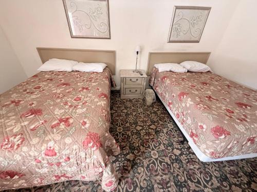 Laurel Park Hotel | SunShine Inn & Suite