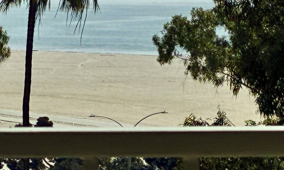 Waterfront Condo | Surf to Turf: Beachfront Stay Minutes from the World Cup