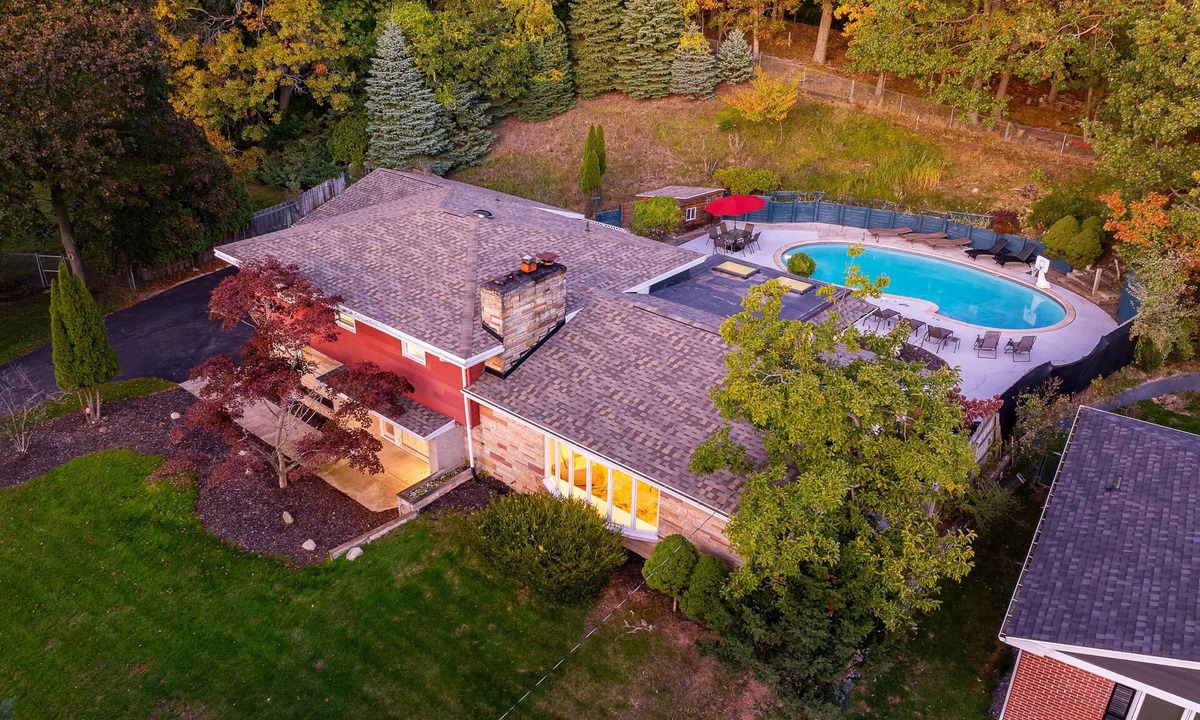 Norton Shores House | Swimming in the Woods