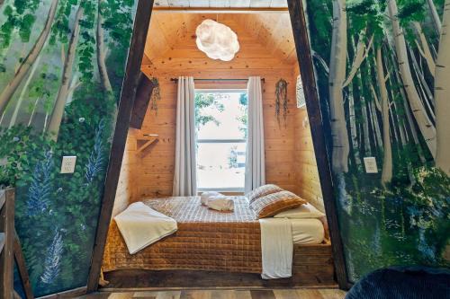 Bryant House | TeePee at Paradise Point with a hot tub fire pit & grill