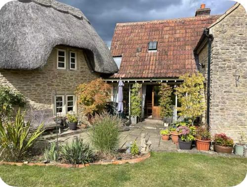 Chippenham House | Thatch Cottage B&B