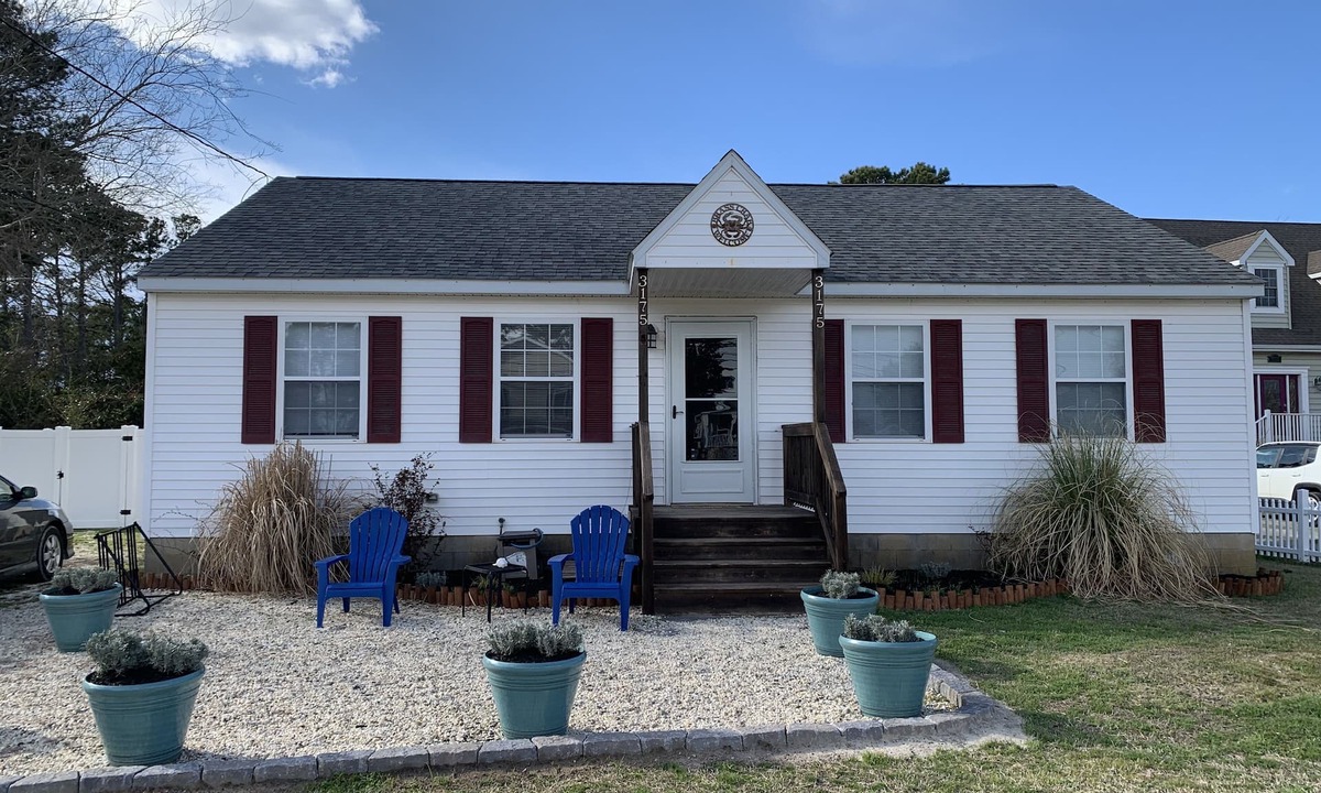 Chincoteague House | The Brass Crab - Check in/out any day!