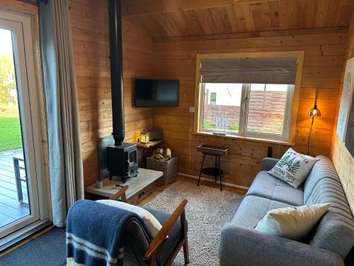 Hawkinge House | The Cabin log fire cosy home