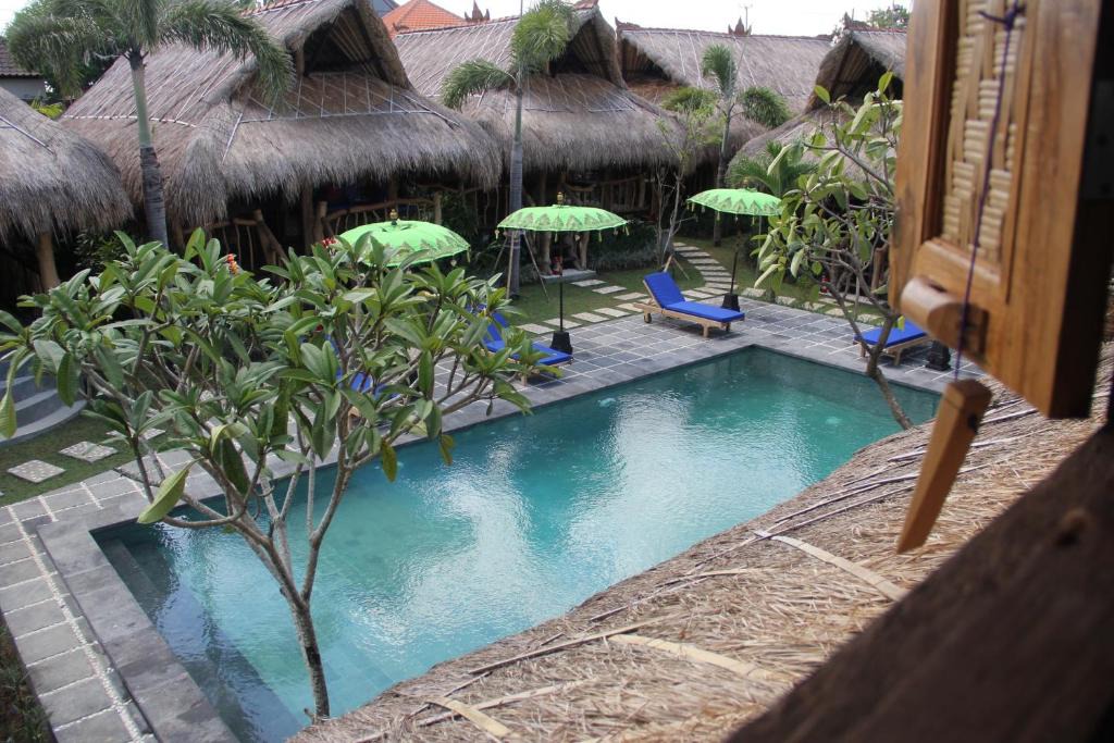 Batu Bolong Resort | The Calmtree Bungalows
