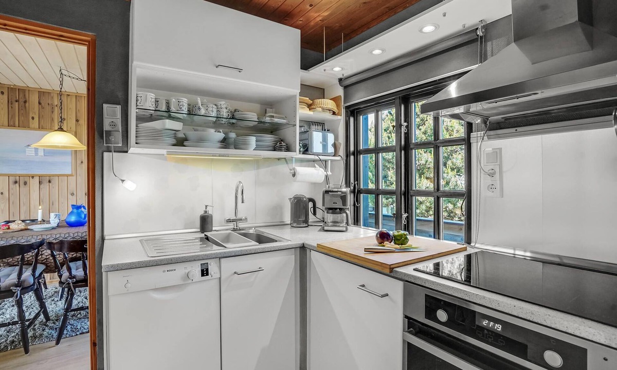 Rindby Strand House | The charming and well-maintained house is situated on a charming dune plot.