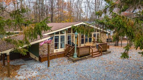 Lake Ariel Ski Chalet | The Fairway Lodge Game Room Fire Pit Tee Tim