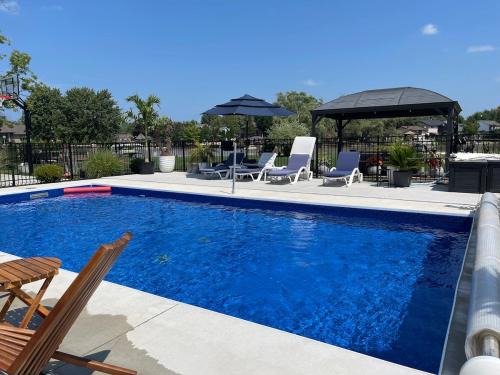 Belle River House | The Grand River Retreat with heated Pool & hot tub