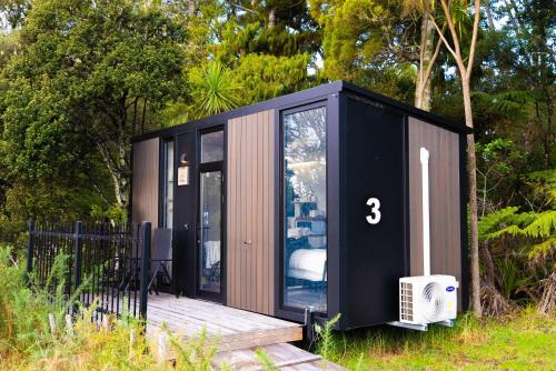 Waitoki House | The Kauri Haven by Tiny Away