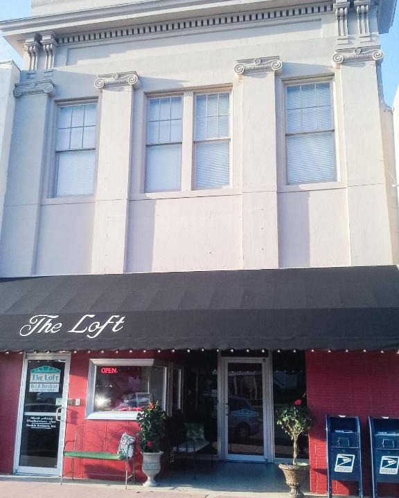 Magnolia Hotel | The Loft on the Square