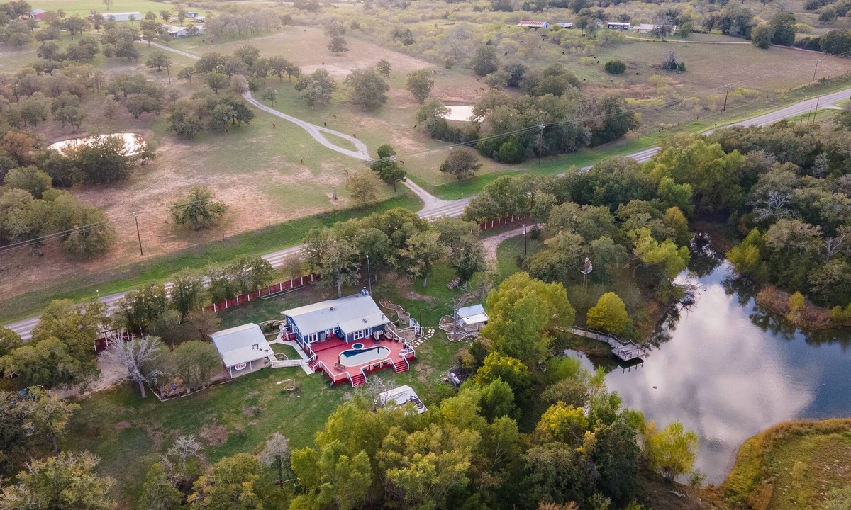Cedar Creek House | The Outdoor Oasis Pool with No Heat/Fire Pit/Ponds