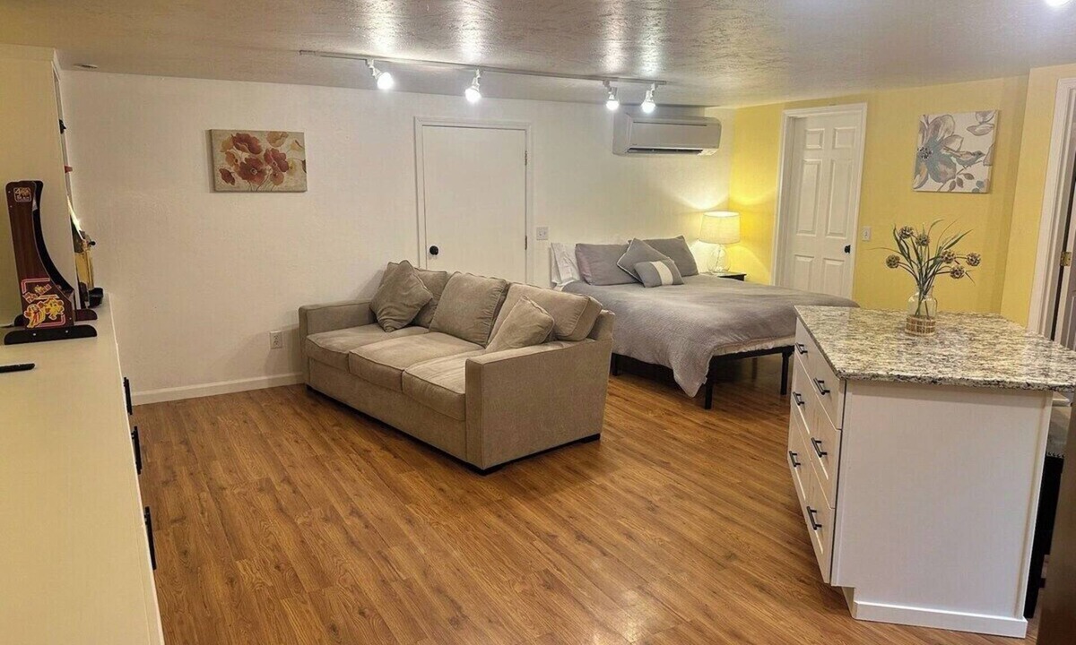 Medford Apartment | The Pool House, step into a backyard oasis.