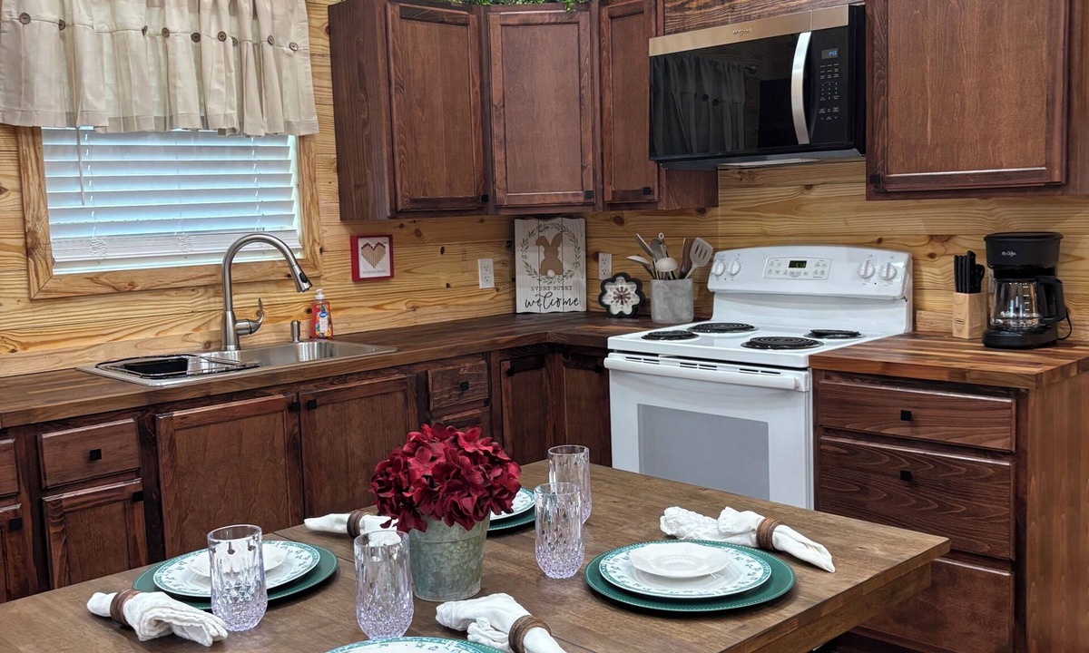 Dennis Cabin | The Red Magnolia on the Lake
