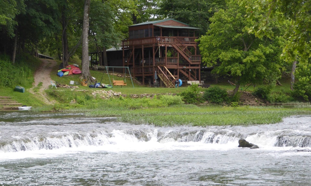 Hardy Cabin | The River Cabin at Miramichee Falls in Hardy on the waterfront with kayaks