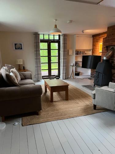 Bodenham House | The Smithy, Wonderful Riverside Accommodation