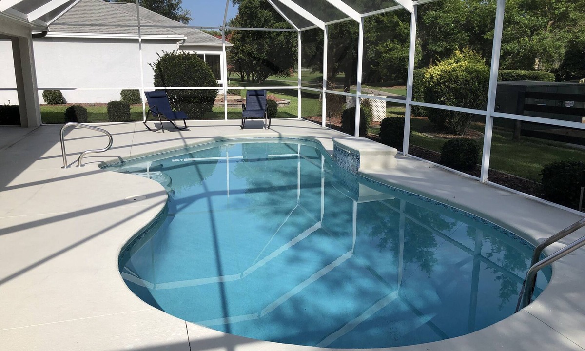 The Villages House | The Villages POOL home with a golf course view