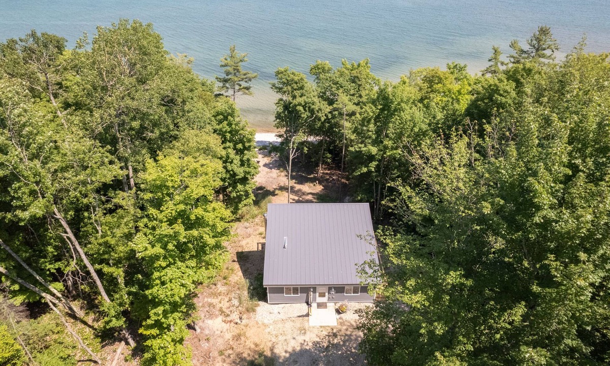 Manistique House | Thimbleberry Cottage: Your Summer Escape with Private Beach Access!
