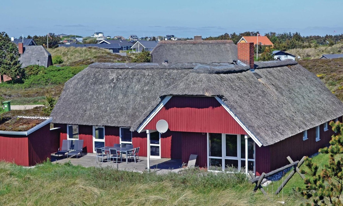 Henne Strand House | This vacation home with pool and sauna at Henne Strand enchants with its proximity to the best swimm