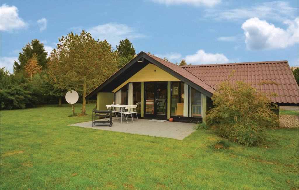 Knubbeløkke House | Three-Bedroom Holiday Home in Nakskov