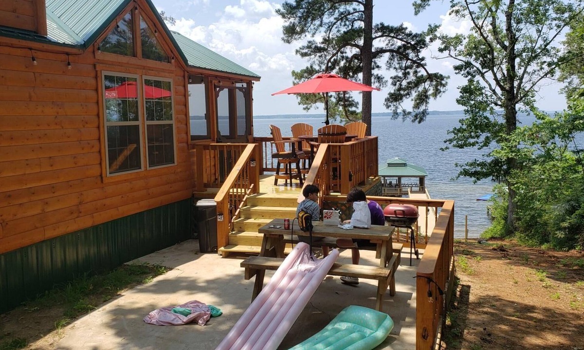 Negreet Cabin | Tiny Toledo - Lakefront Cabin with Boathouse, Fishing Pier, and DRAMATIC Sunsets