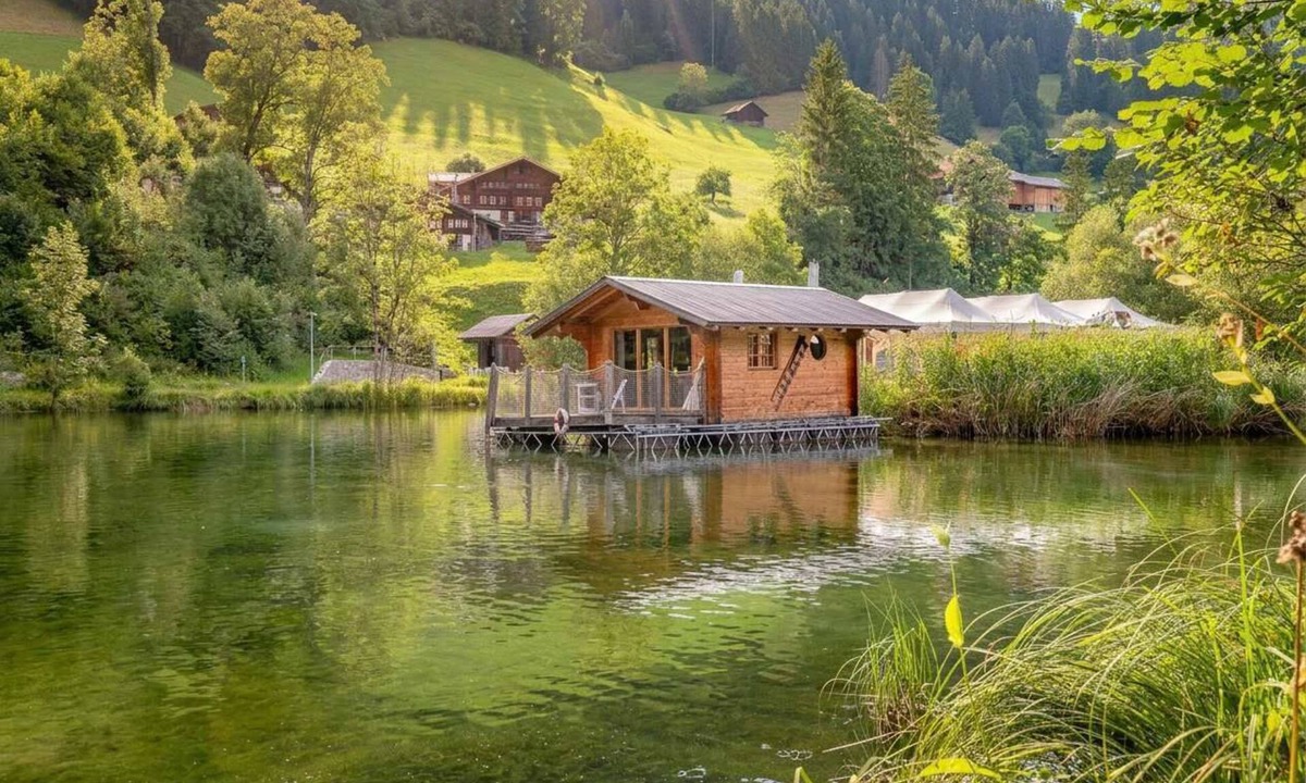 Zweisimmen House | Tiny Waterhouse on a Lake with shared Bathroom
