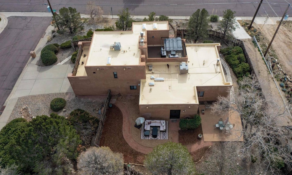 Northeast Heights House | Tranquil Trails- Spacious, Rooftop Deck, Pet Friendly, 2 Car Garage, 75 Inch TV