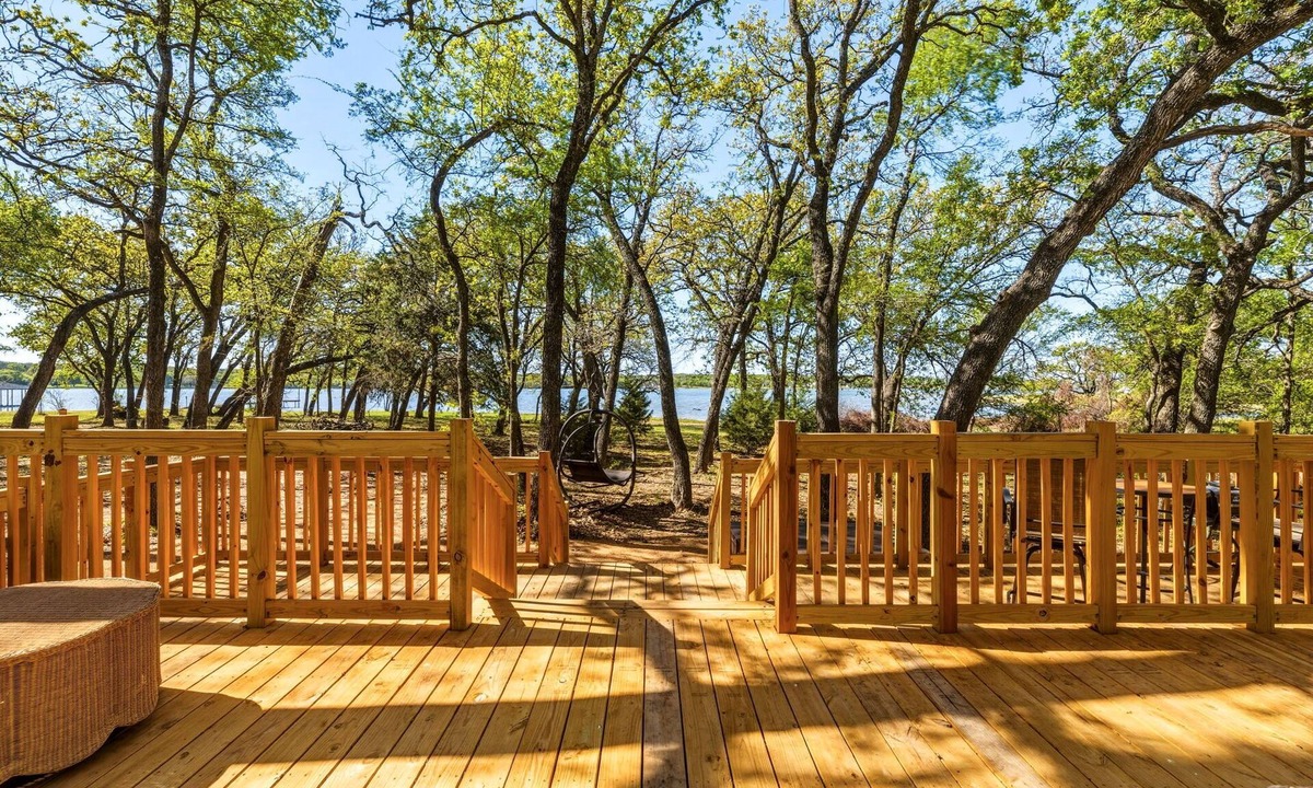 StarCrest Estates House | Travel Trailer at the Water w Easy Access, Hot Tub, Grill, 2-Tier Deck