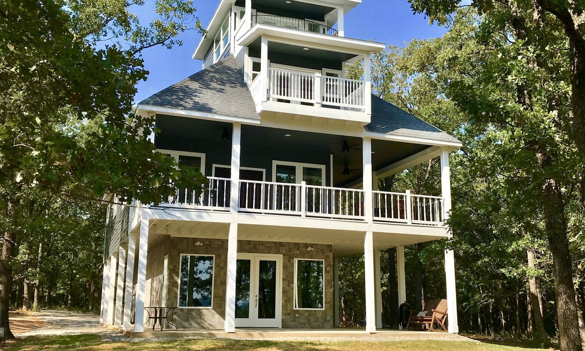 Pottsboro House | Tree Top Lake Views with lake access for swimming fishing boating 250 ft away!