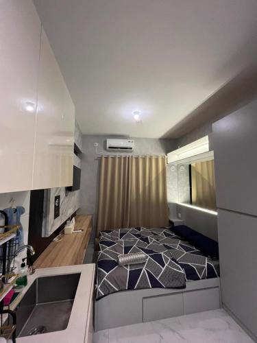 Serpong Apartment | Treepark BSD by Kakarama Room