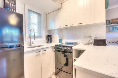 Treasure Island Resort | Tropic Terrace #32 - Beachfront Rental