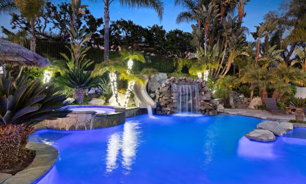 West Ridge House | Tropical Paradise: Enchanting Vacation Home with a Resort-Style Oasis Backyard!