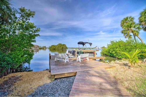 Snug Harbor Estates Villa | Tropical Waterfront Beach Home with Pool & Jacuzzi