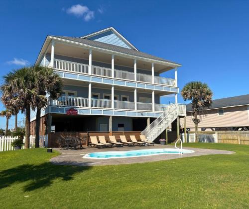 Cherry Grove Beach House | True Oceanfront 7 Suites Private Pool Sleeps 24 Anderson Cottage