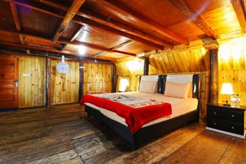 Ambarita House | Tuk Tuk Timbul Bungalows
