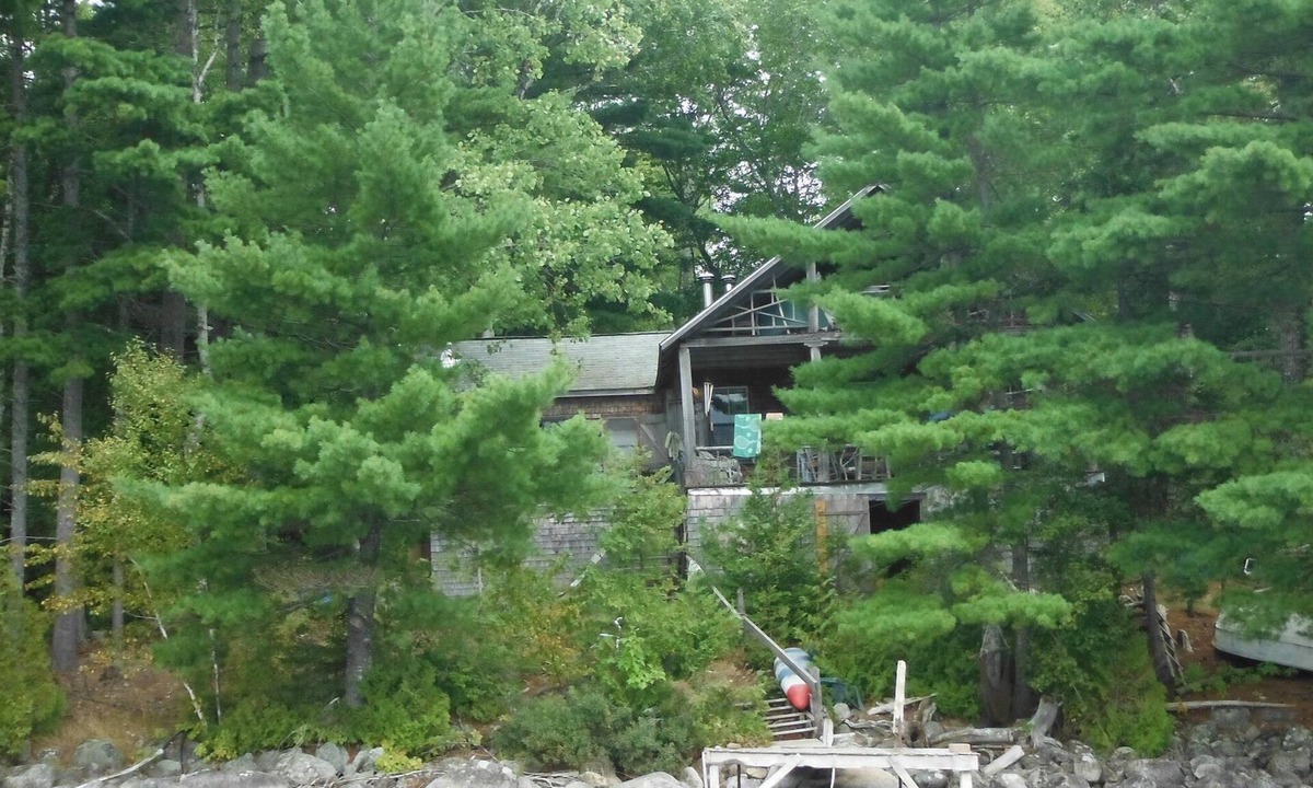 Forest CIty Cottage | Turn Of The Century Cabin On Private Island