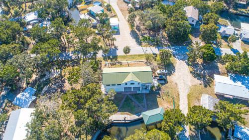 Crystal River House | Twin Heron Hideaway on Ozello Trail on a deep water canal, hot tub, kayaks, firepit, sleeps 6.
