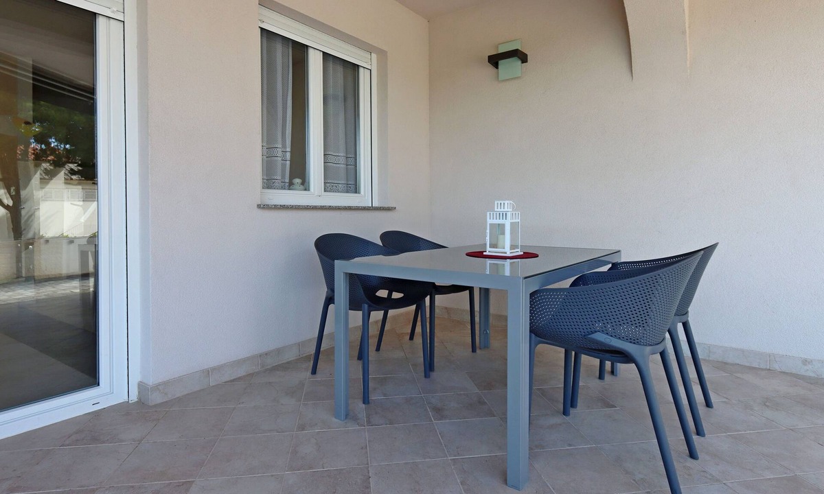 Banjol Apartment | Two bedroom apartment with terrace Banjol, Rab (A-12838-a)
