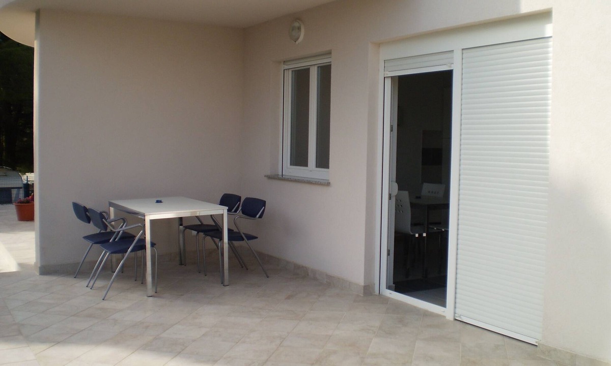 Banjol Apartment | Two bedroom apartment with terrace Banjol, Rab (A-12838-b)