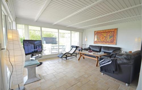Remmer Strand House | Two-Bedroom Holiday Home With A Fireplace In Struer