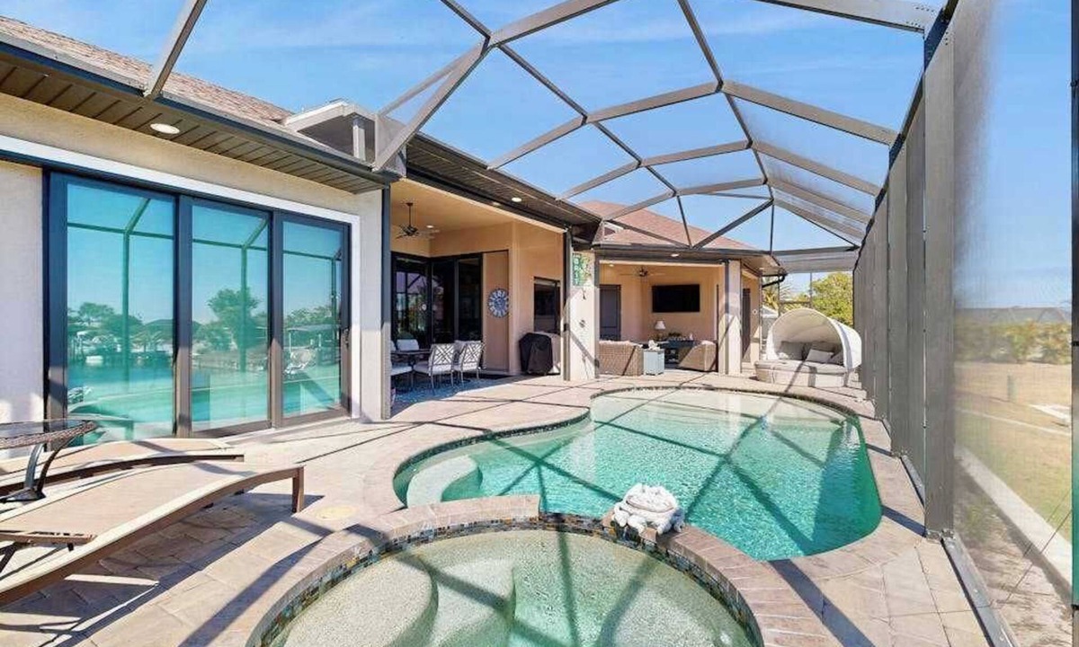 Edgewater House | Ultimate waterside retreat with private dock, lanai, pool & spa, BBQ and WiFi