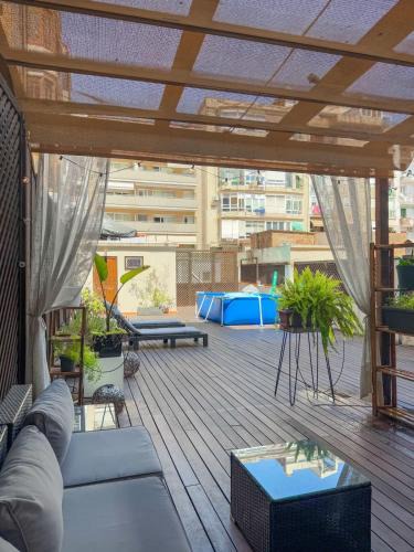 el Camp d'en Grassot i Gracia Nova Apartment | Unique central home with large terrace & pool